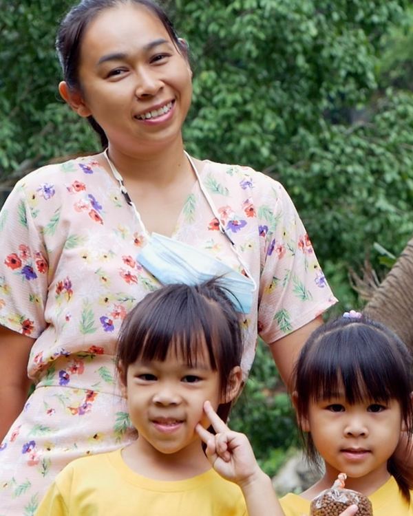 A mother and her two daughters in northern Thailand.